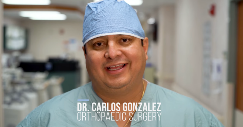 Dr. Carlos Gonzalez, orthopedic surgeon, speaking in a hospital setting