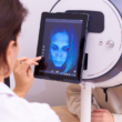 A dermatologist checking the skin of a person through a Skin Analysis Machine.